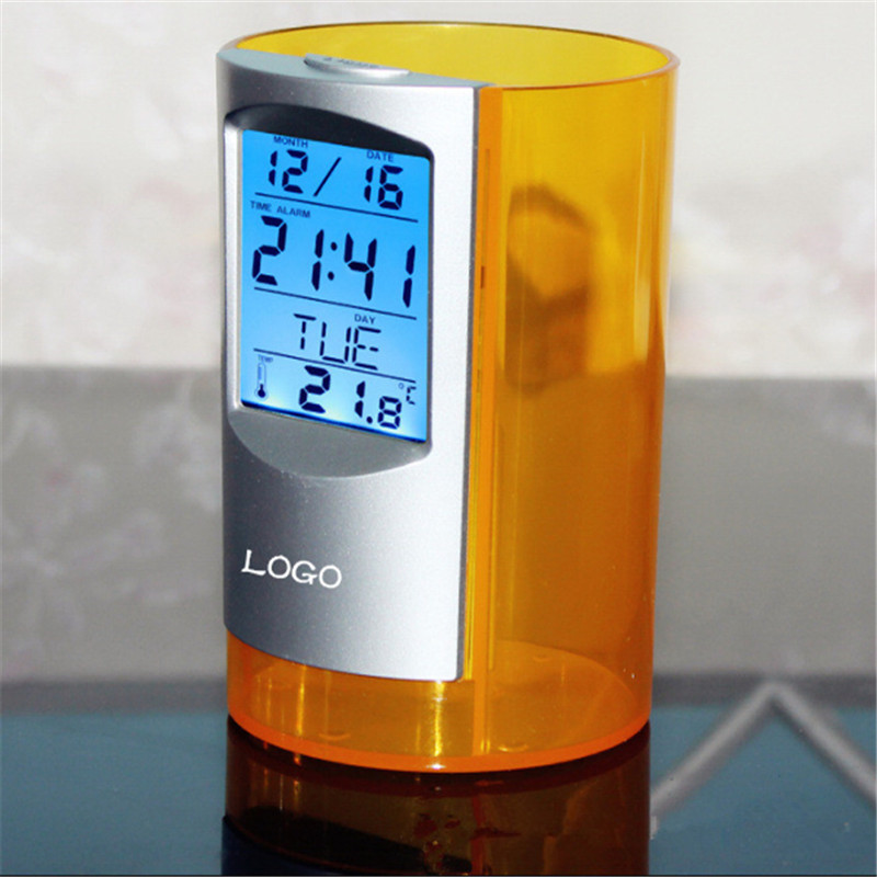 orange plastic pen/pencil holder with Calendar